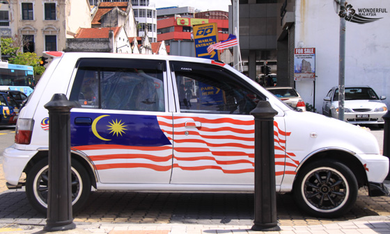 malaysian car with flag