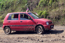 Car stuck in the mud in the Kinabatangan area Car stuck in the mud in the Kinabatangan area